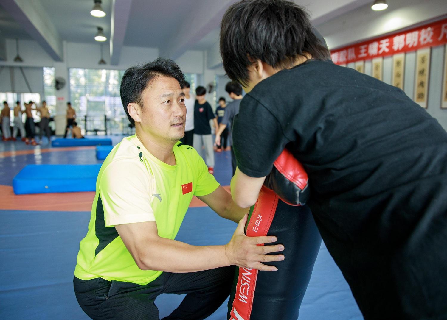 1032115769340648.jpg 5版---甘当运动员成长“铺路石”(3)-20231016102607.jpg